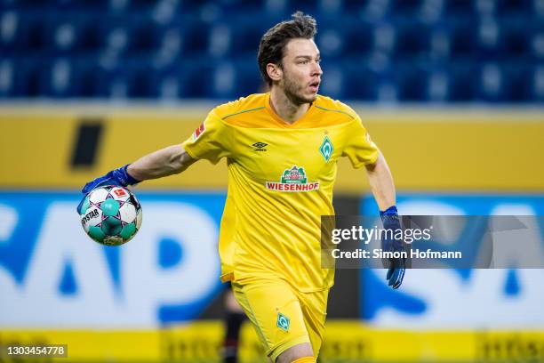 Jiri Pavlenka of Bremen in action during the Bundesliga match between TSG Hoffenheim and SV Werder Bremen at PreZero-Arena on February 21, 2021 in...