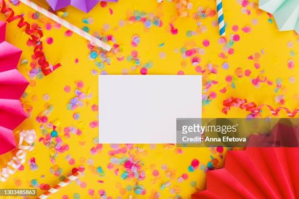 illuminating yellow festive background with multicolored confetti and colorful paper craft figures and straws and blank copy space. trendy colors of the year. festive concept - craft cocktail stock pictures, royalty-free photos & images