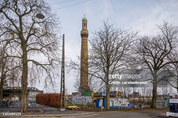 mosque looking tower - minaret stock pictures, royalty-free photos & images