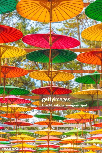 colorful paper handmade umbrellas decorate at chiang mai, thailand, asia - cidade de chiang mai imagens e fotografias de stock