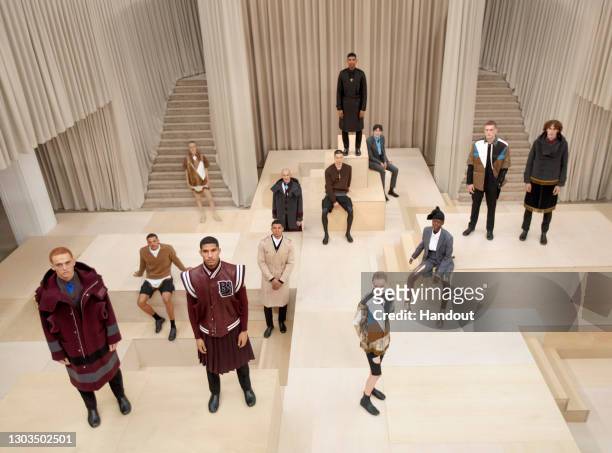In this handout image provided by Burberry, models pose on the runway during the Burberry Autumn/Winter 2021 Menswear Presentation during LFW...
