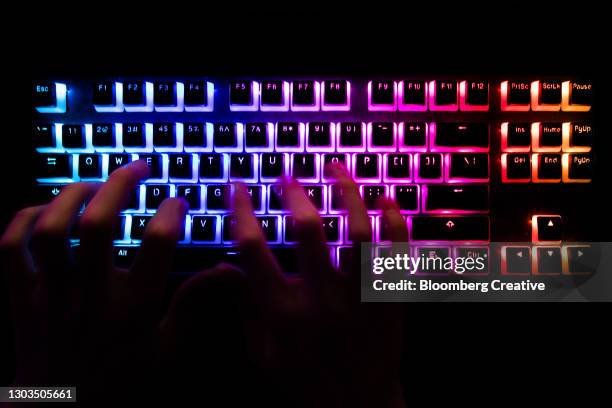 laptop keyboard and cyber crime - antivirus foto e immagini stock