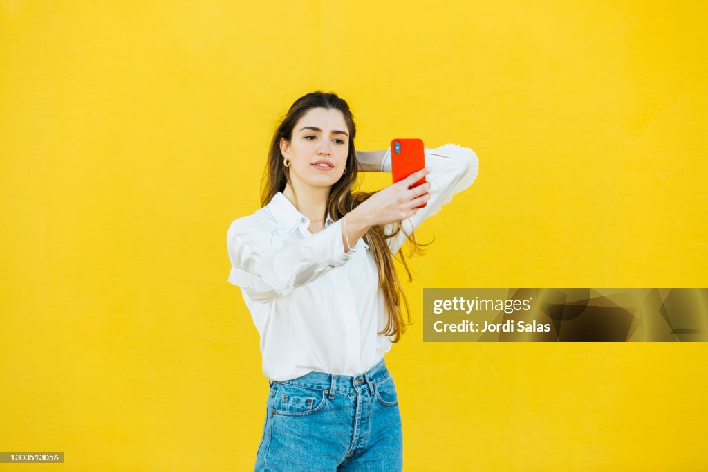 Young girl taking a selfie