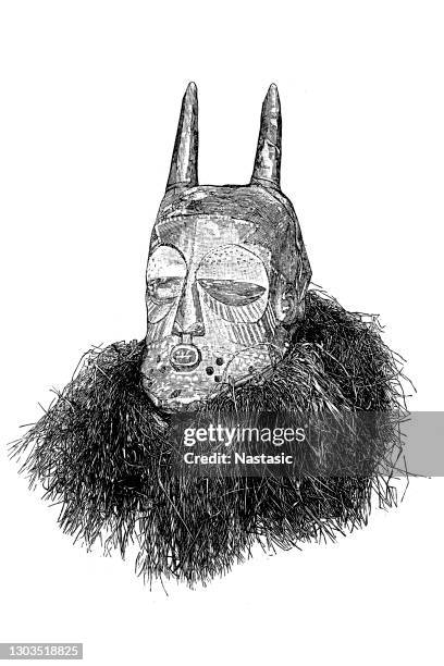 illustrations, cliparts, dessins animés et icônes de masque, sculpté et peint, avec deux cornes et une barbe faite de félins raphia - masque africain