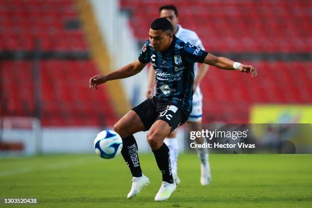 Jefferson Montero of Queretaro drives the ball during the 7th round match between Queretaro and Puebla as part of the Torneo Guard1anes 2021 Liga MX...