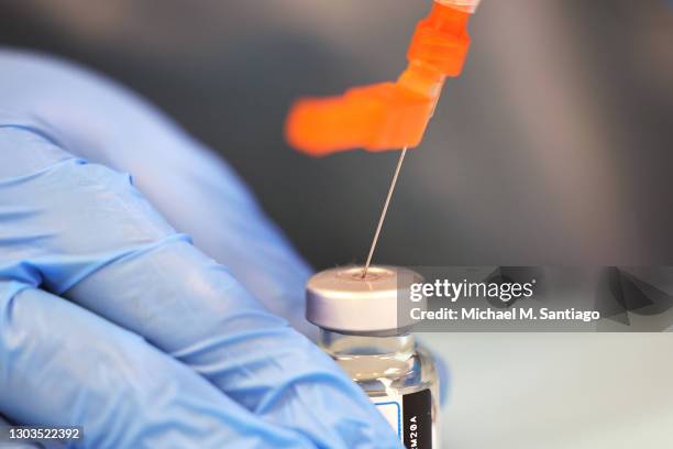 Anya Harris prepares a Moderna coronavirus vaccine at Red Hook Neighborhood Senior Center in the Red Hood neighborhood of the Brooklyn borough on...