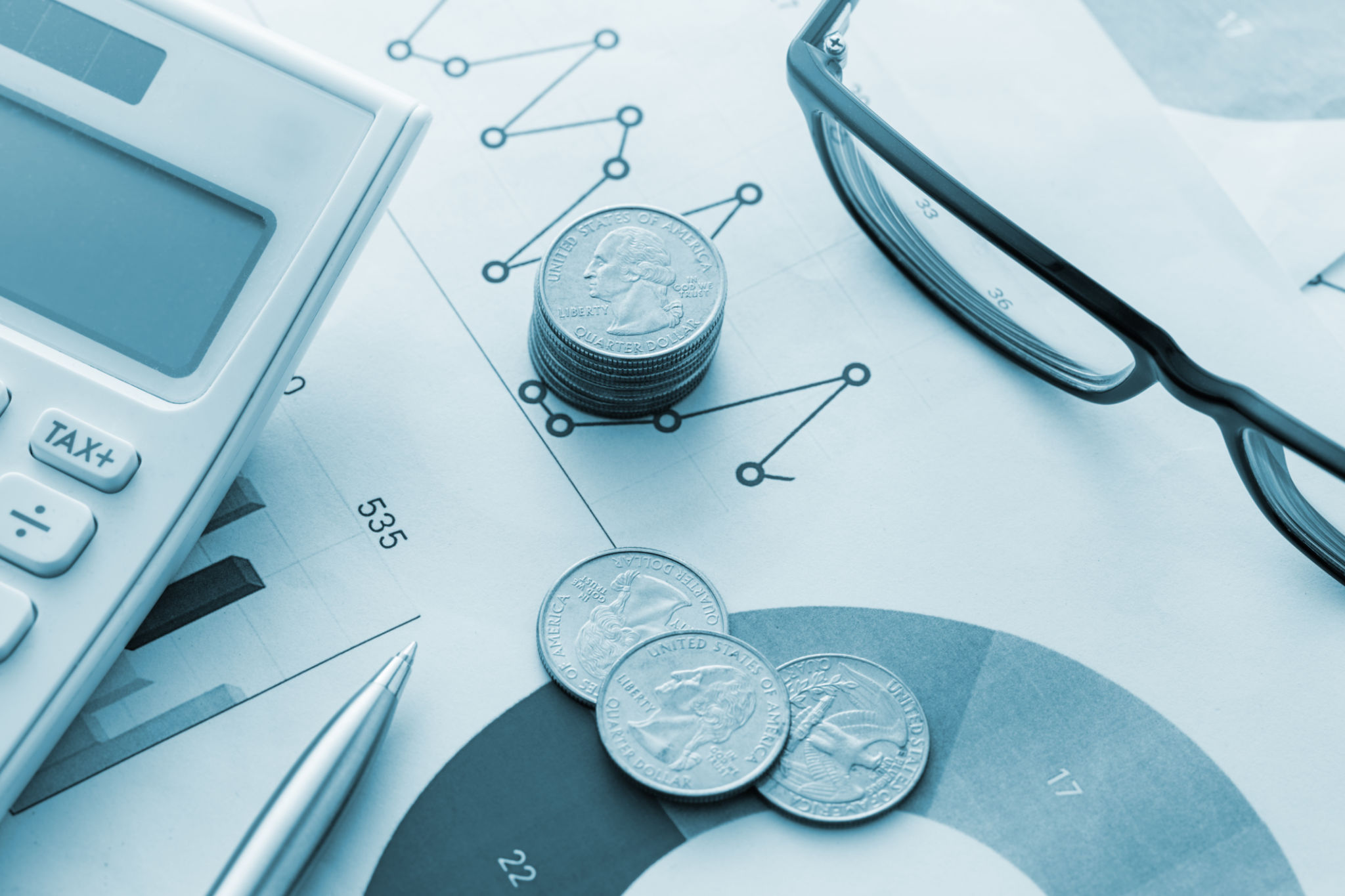 Economich charts and stacked coins Economich charts and stacked coins