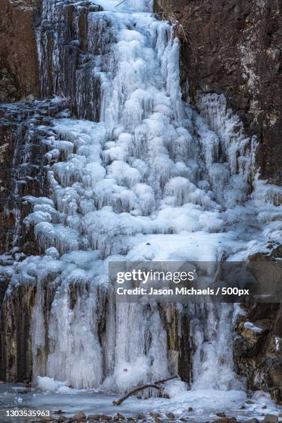 scenic view of waterfall in forest,hemlock falls,united states,usa - frozen waterfall stock pictures, royalty-free photos & images