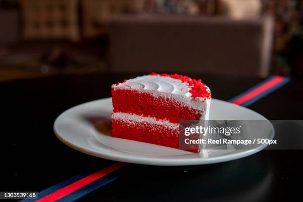 close-up of cake in plate on table - cake slices stock pictures, royalty-free photos & images