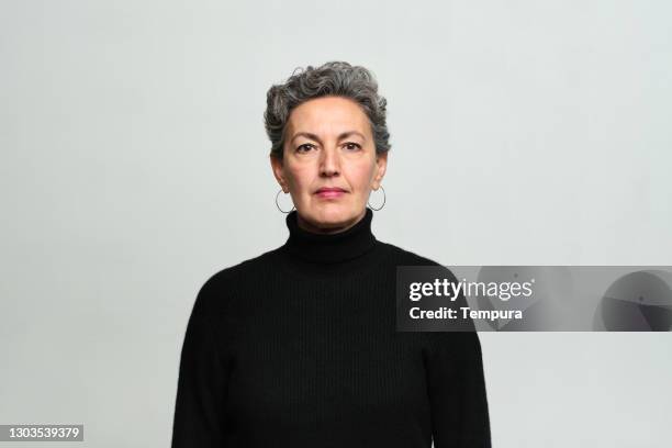 waist-up portrait of an elegant middle-aged woman. - neckline stock pictures, royalty-free photos & images