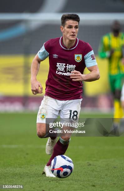 Ashley Westwood of Burnley in action during the Premier League match between Burnley and West Bromwich Albion at Turf Moor on February 20, 2021 in...