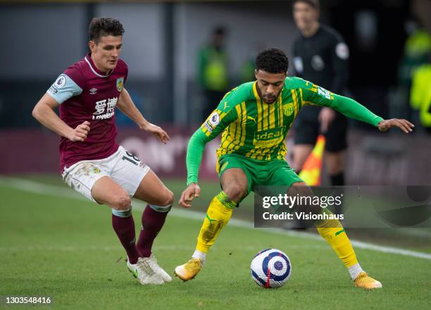 Darnell Furlong of West Bromwich Albion and Ashley Westwood of Burnley in action during the Premier League match between Burnley and West Bromwich...