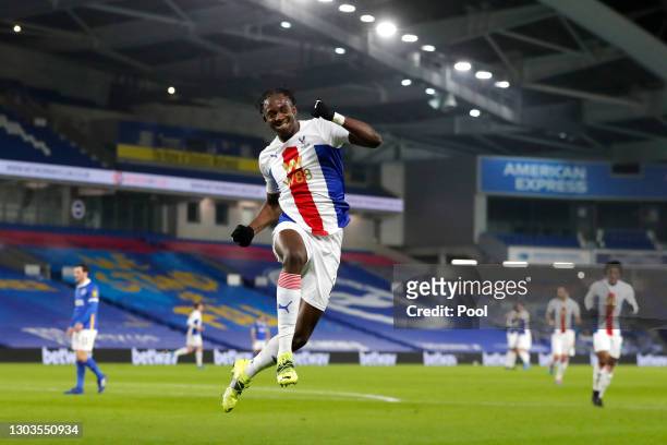 Jean-Philippe Mateta of Crystal Palace celebrates after he scores their team's first goal during the Premier League match between Brighton & Hove...