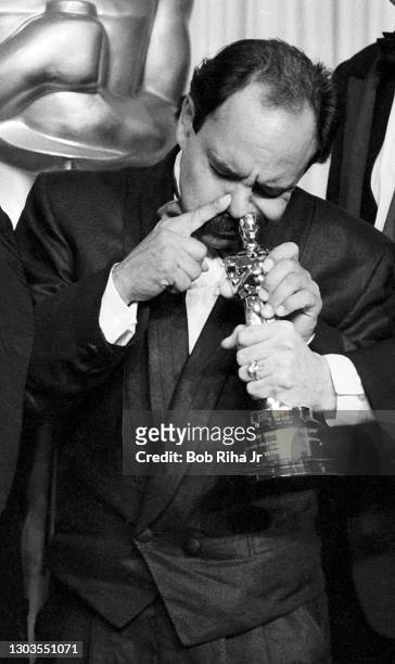 Oscar presenters Cheech Marin and Tommy Chong have some fun after presenting the Best Visual Effects Award backstage at the 56th Annual Academy...