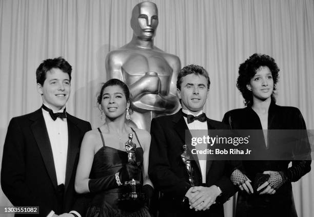 Best Song Winners for 'Flashdance' Irene Cara and Keith Forsey , with presenters Matthew Broderick, and Jennifer Beals backstage at the 56th Annual...