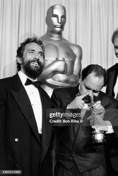 Oscar presenters Cheech Marin and Tommy Chong have some fun after presenting the Best Visual Effects Award backstage at the 56th Annual Academy...