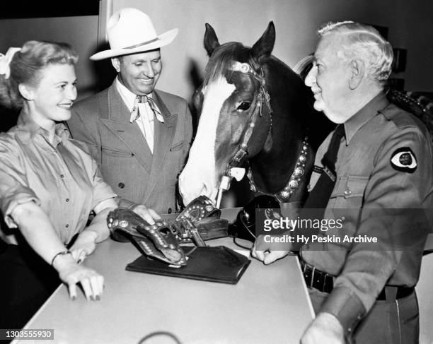 American singer, songwriter, actor, musician, and rodeo performer Gene Autry , American actress and singer Gail Davis and Autry's horse Champion the...