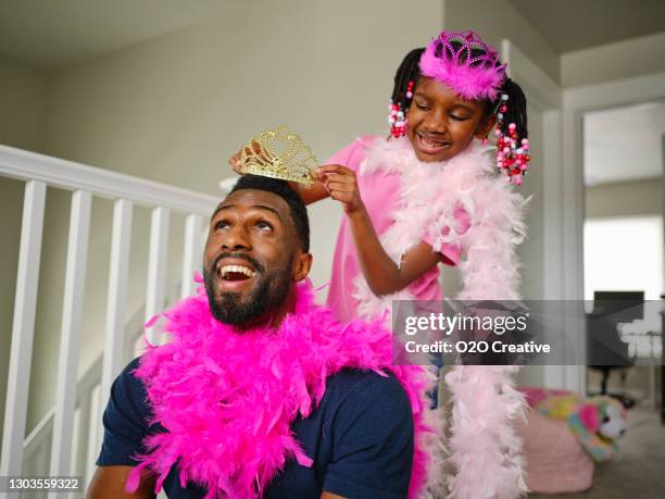dad and daughter playtime dress-up - dressing up stock pictures, royalty-free photos & images