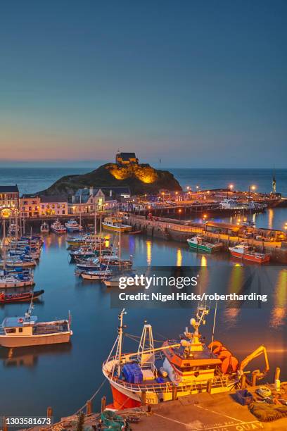 a classic dusk view of a north devon fishing harbour at ilfracombe, on devon's atlantic coast, devon, england, united kingdom, europe - ilfracombe stock pictures, royalty-free photos & images