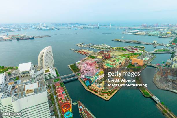aerial view of yokohama cityscape and skyline at minato mirai waterfront district over the port at twilight from viewing platform of landmark tower, skyscrapers from observatory sky garden, yokohama, honshu, japan, asia - yokohama skyline stock pictures, royalty-free photos & images