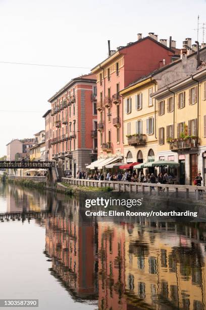 old buildings reflected in the naviglio grande, milan, lombardy, italy, europe - milan cafe stock pictures, royalty-free photos & images