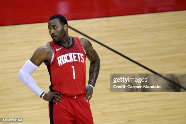 John Wall of the Houston Rockets looks on during the first quarter of a game against the Chicago Bulls at the Toyota Center on February 22, 2021 in...