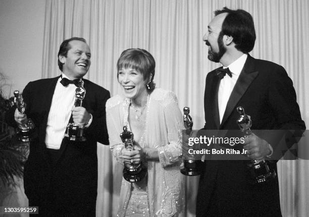 Shirley MacLaine Jack Nicholson and James L. Brooks enjoy a winning moment together backstage at the 56th Annual Academy Awards Show, April 9, 1984...