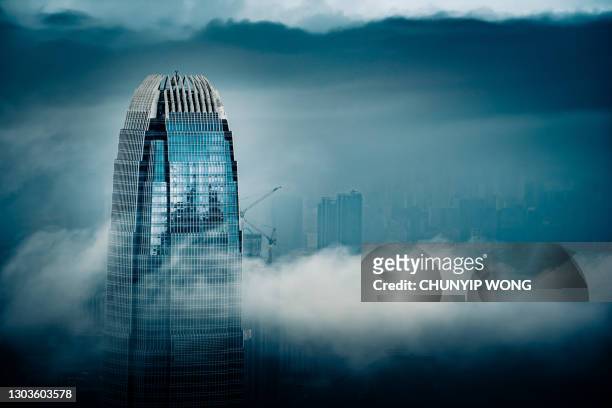 low visibility on victoria harbour in hong kong - ifc stock pictures, royalty-free photos & images