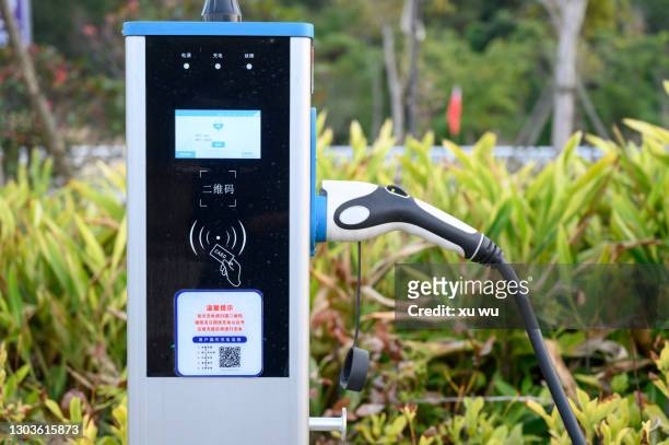 new energy vehicle charging - animals charging stock pictures, royalty-free photos & images