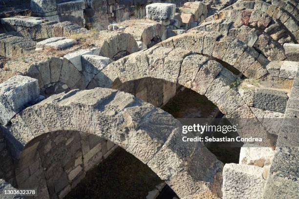 underground ruins of agora, tunnels archaeological site in smyrna, izmir, turkey. - agora stock pictures, royalty-free photos & images