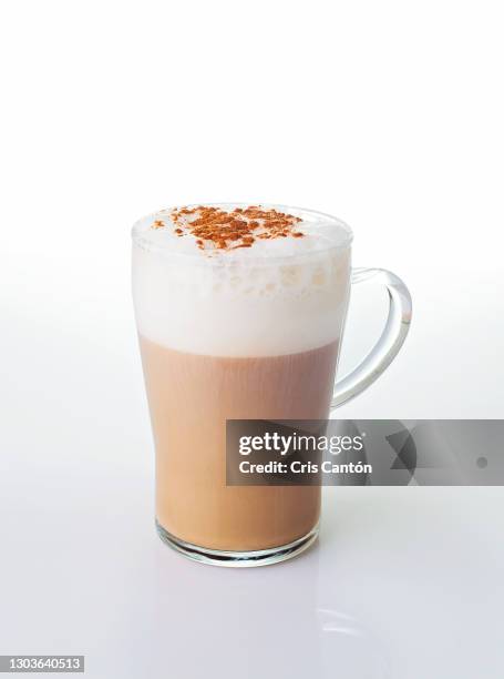 glass of cappuccino on white background - cream dairy product stock-fotos und bilder