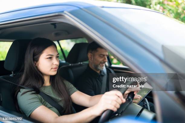 learning to drive. - learner driver stock pictures, royalty-free photos & images