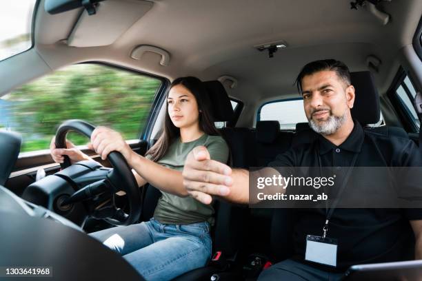 giving direction to learner. - learner sticker stock pictures, royalty-free photos & images