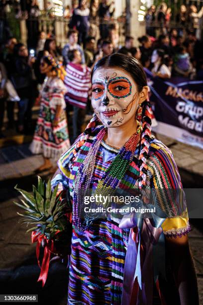 day of the dead parade - women wearing traditional dresses walking on the parade - day of the dead stock pictures, royalty-free photos & images