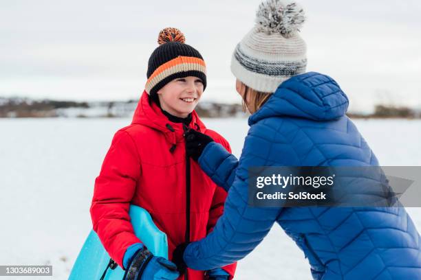 ik zal je helpen zoon - rits stockfoto's en -beelden