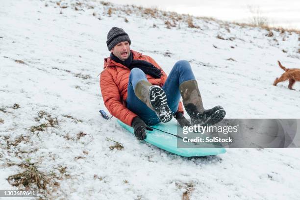 Man Riding Sled 5,573 Man Sledding Stock Photos, High-Res Pictures, and Images - Getty ...