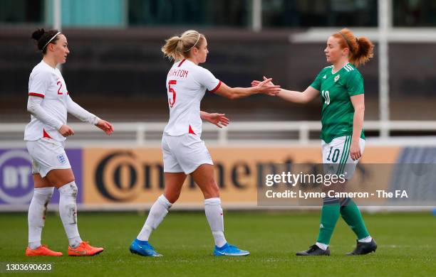 Steph Houghton of England interacts with Rachel Furness of Northern Ireland at full-time after the Women's International Friendly match between...