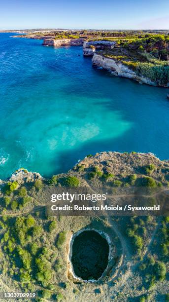 grotta sfondata open sea cave, salento, apulia - otranto stock pictures, royalty-free photos & images