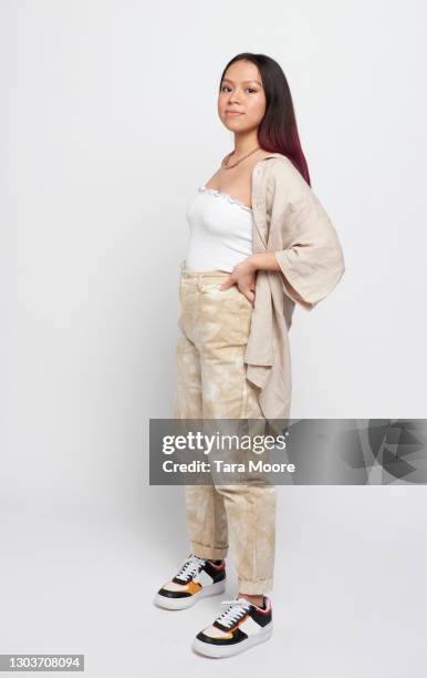 young woman standing - fashion model on white stock pictures, royalty-free photos & images