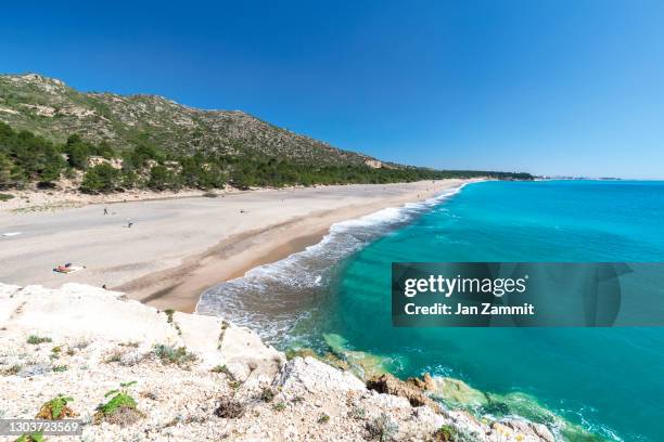 platja del torn - tarragona stock-fotos und bilder