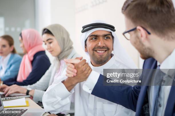 multiethnic group of businesspeople or university students - kaffiyeh stock pictures, royalty-free photos & images