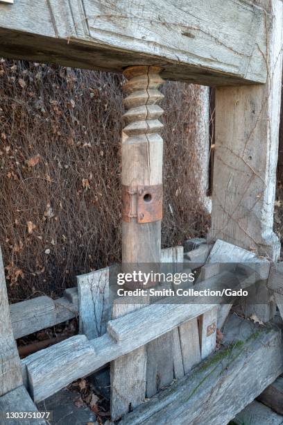 Side shot of the threaded spindle of the old manual wine press at V. Sattui Winery in St Helena, California, February 6, 2021.