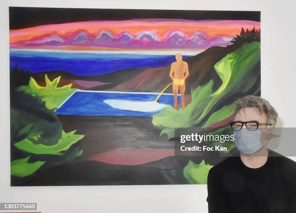 Laurent Zorzin from Galerie Arts Factory poses with A work of Tom de Pekin during "Ou Vont Les Fleurs Du Temps Qui Passe" : Tom de Pekin Solo Show At...
