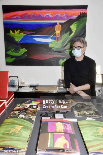 Laurent Zorzin from Galerie Arts Factory poses with A work of Tom de Pekin during "Ou Vont Les Fleurs Du Temps Qui Passe" : Tom de Pekin Solo Show At...
