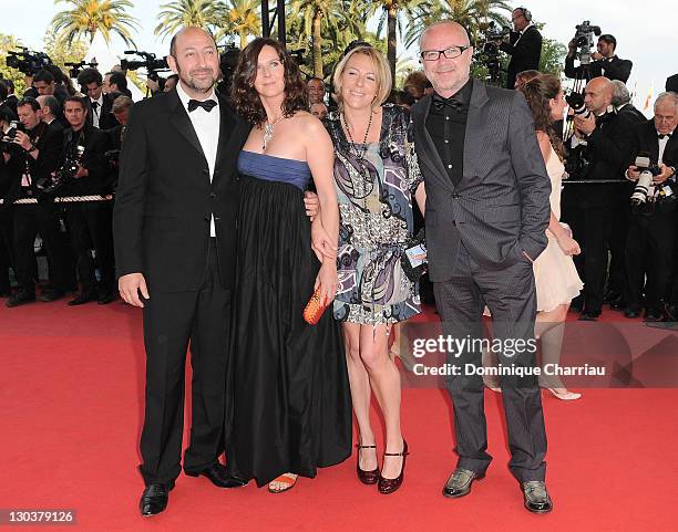 Actor Kad Merad, his wife Emmanuelle Cosso, guest and Olivier Baroux attend the Vengeance Premiere at the Grand Theatre Lumiere during the 62nd...