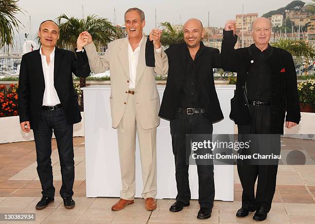 Philippe Val, Daniel Leconte, director, Richard Malka and artist Georges Wolinski attends the C'est Dur D'etre Aime Par Des Cons Photocall at the...