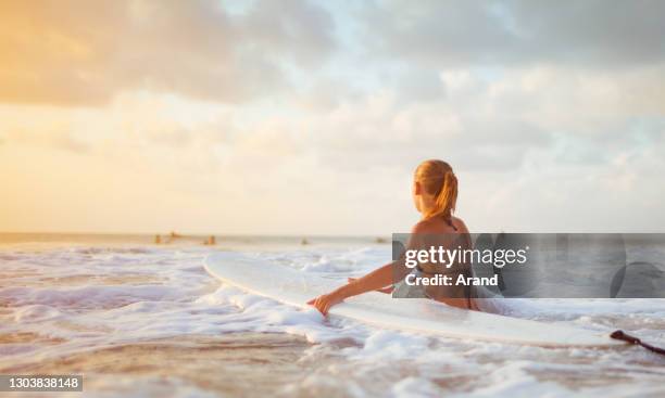 young surfer woman - beach model stock pictures, royalty-free photos & images