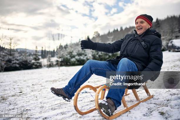 Man Riding Sled 7,498 Man Sledding Stock Photos, High-Res Pictures, and Images - Getty ...