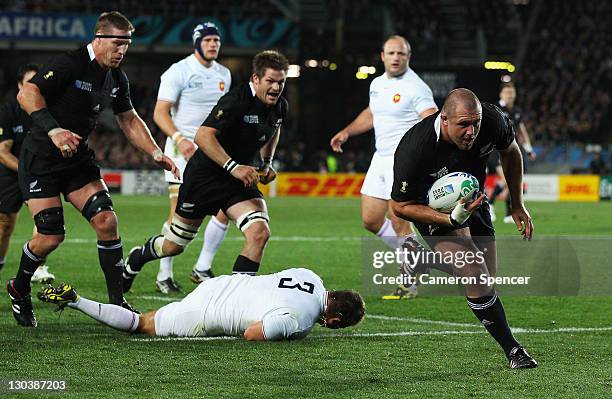 Tony Woodcock of the All Blacks breaks clear on the way to scoring his try during the 2011 IRB Rugby World Cup Final match between France and New...