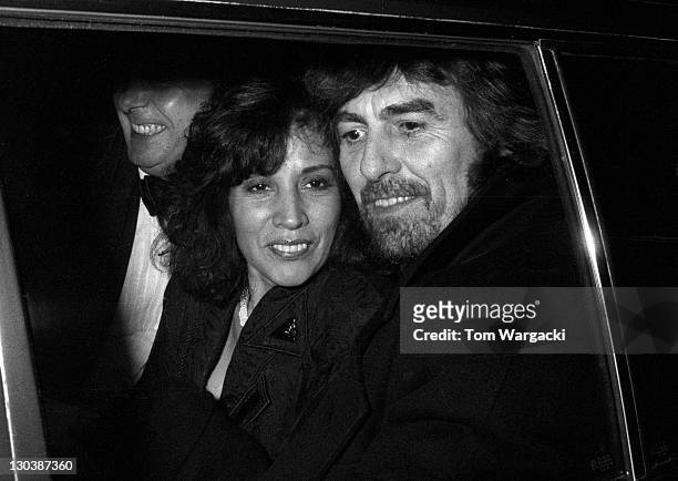 George Harrison with his wife Olivia Harrison at Caprice Restaurant on February 5, 1990 in London.